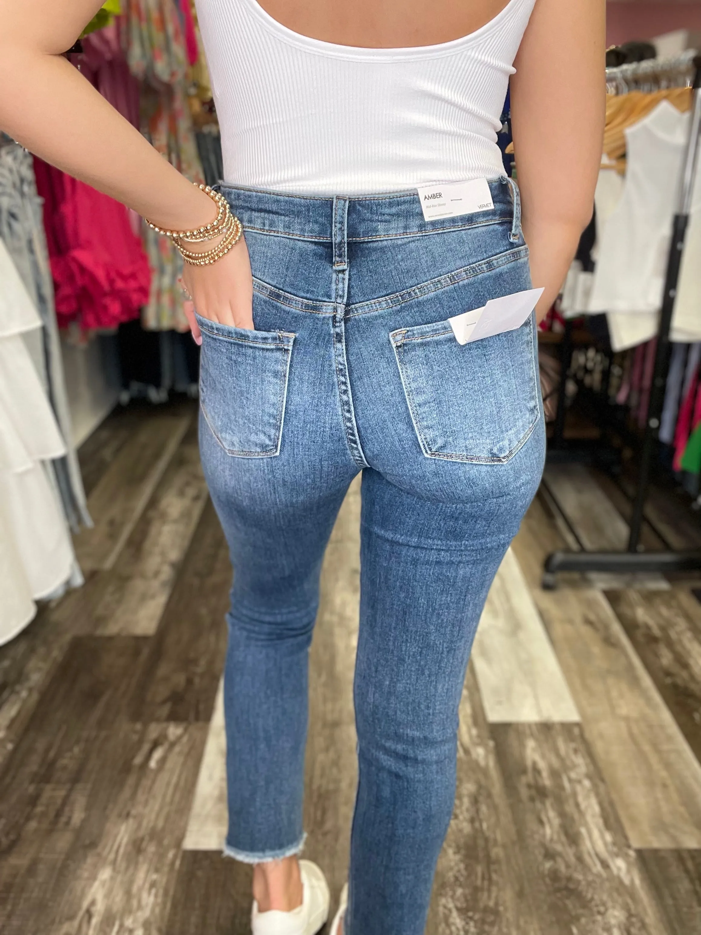 Amber Mid Rise Relaxed Straight Denim