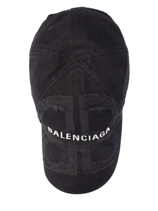 Balenciaga   Distressed cotton denim cap 