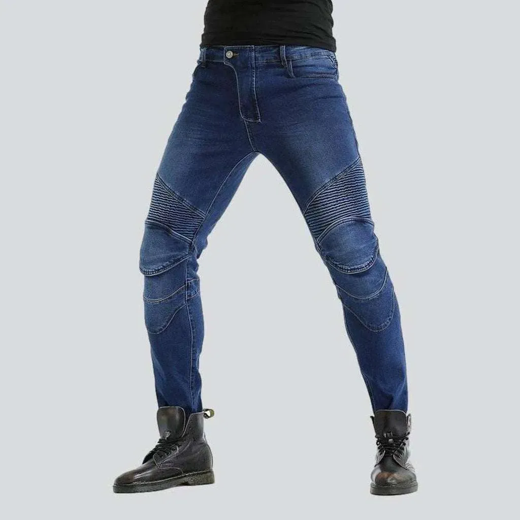 Medium wash men's moto jeans