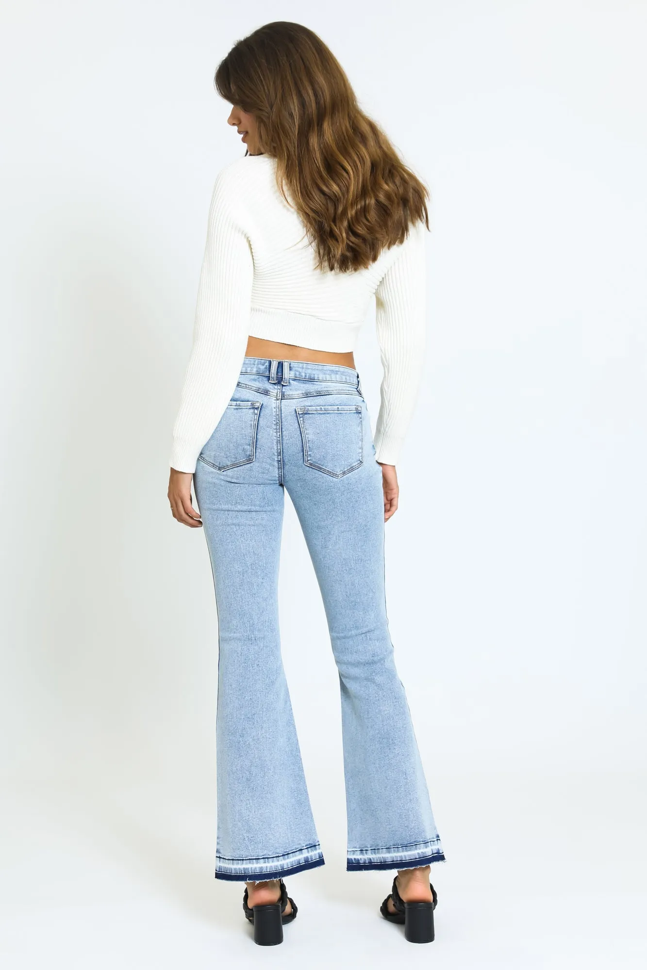 Next Level Low Rise Raw Hem Flare Jeans - Acid Wash