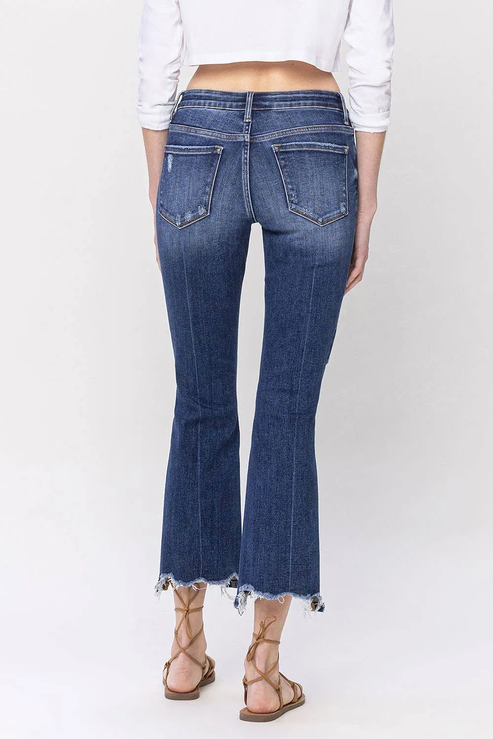 SPELLBOUND MID-RISE CROP KICK FLARE JEANS