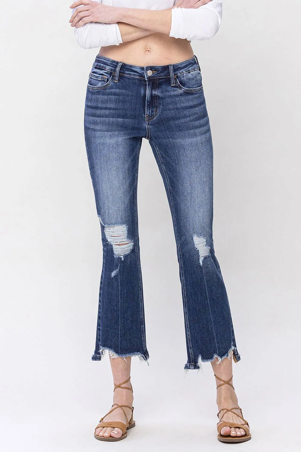 SPELLBOUND MID-RISE CROP KICK FLARE JEANS